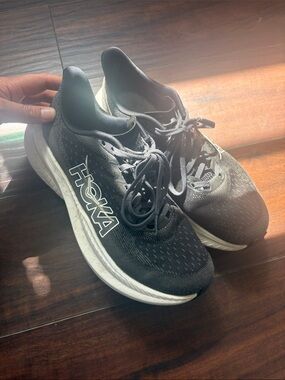 Hoka women’s size 8 Black and White training/Running Shoes